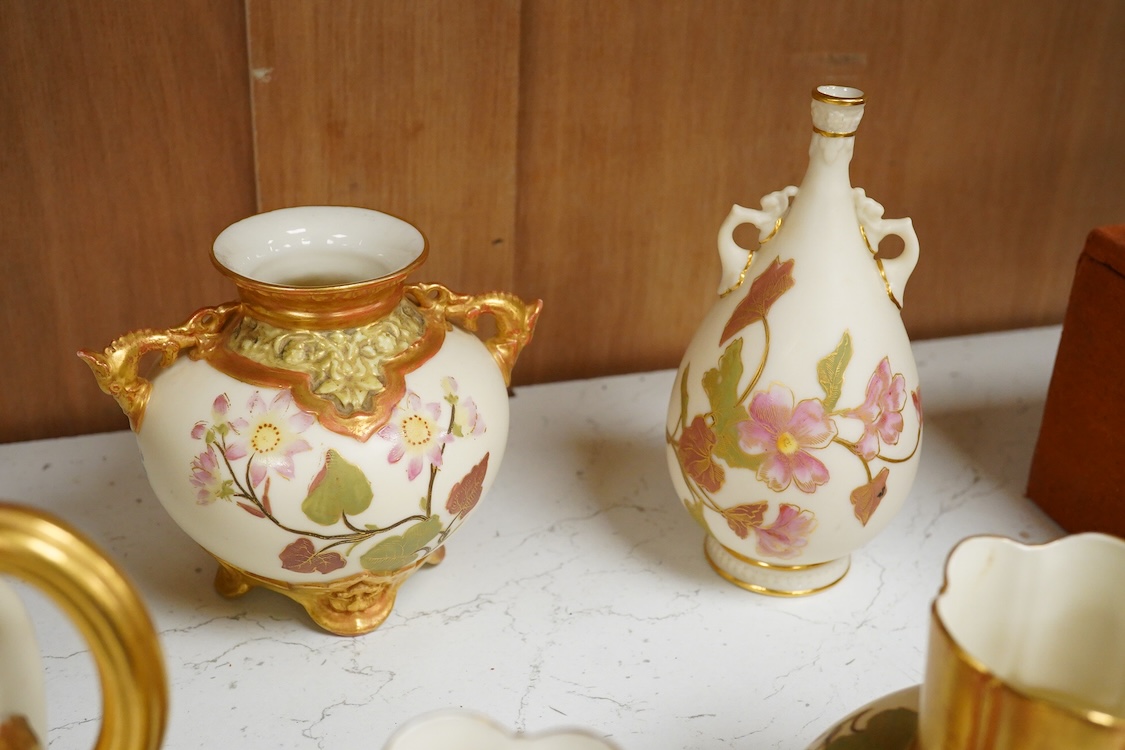 Three Royal Worcester blush ivory jugs, shape 1094, a pair of similar vases and two other Royal Worcester items, the jugs 14cm (7)
